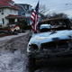 A Burned Truck Holds An American flag In Rockaway, Queens